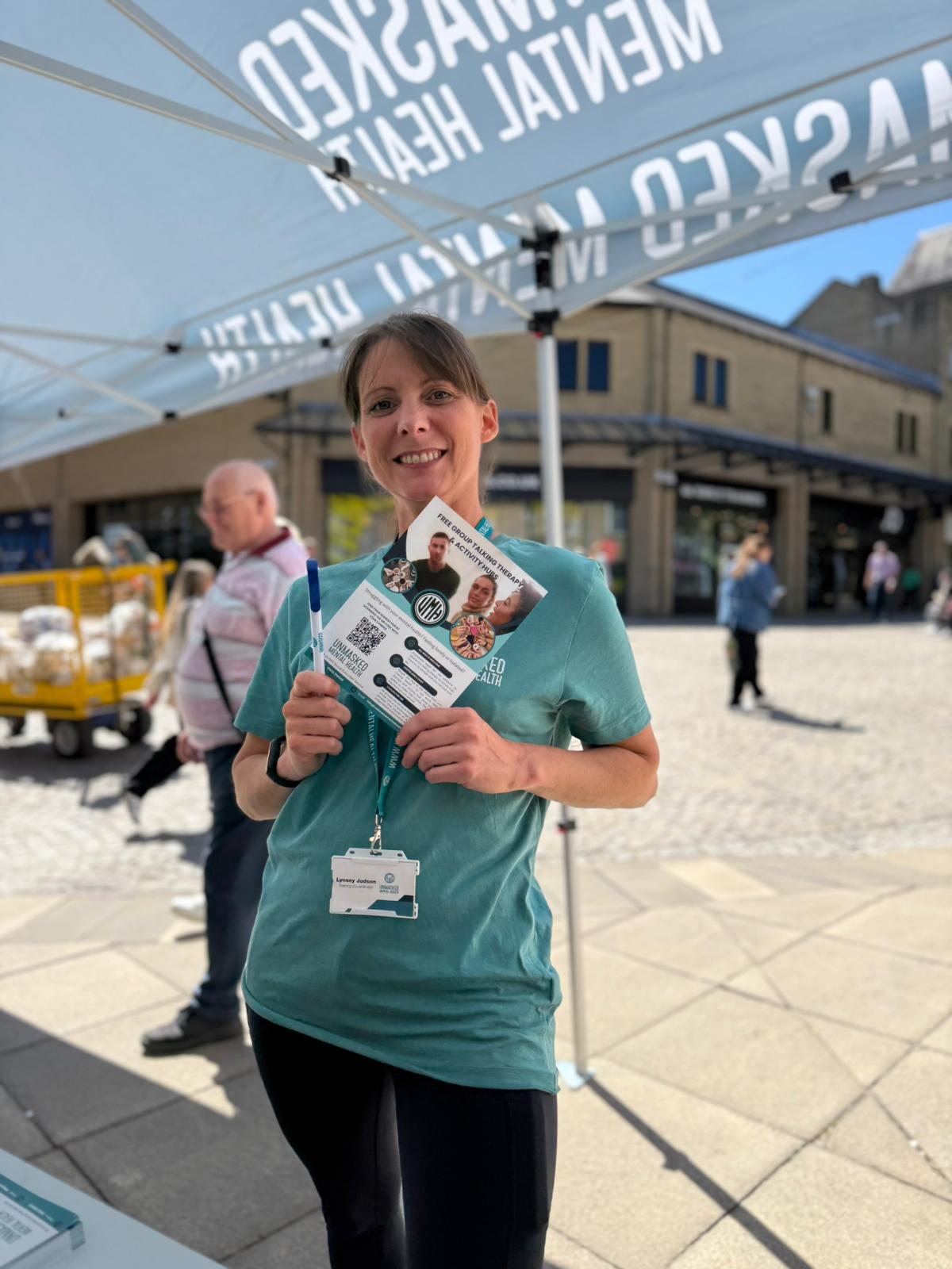 Lynsey from Unmasked Mental Health engaging with the community at an outreach event